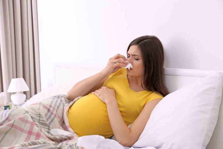 Насморк при беременности в 1 триместре – чем и как лечить: капли, народные средства